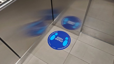 Social distancing signage in an elevator car [02]