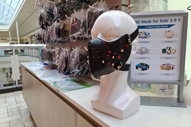 Leather face mask at mall kiosk