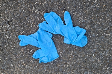 Pair of discarded medical gloves