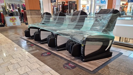 Closed massage chairs at Wheaton Plaza