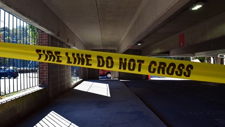 Fire department tape in the Johnson Street parking garage [01]