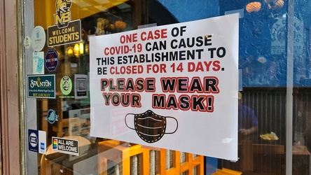 COVID sign at Baja Bean Company