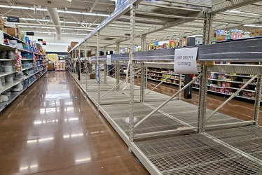 Empty racks for paper products at Walmart [01]