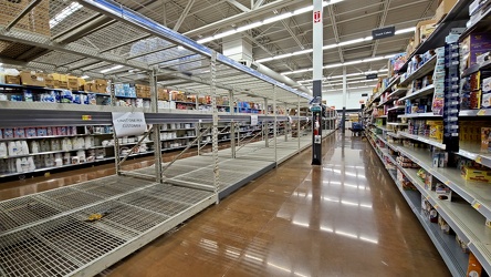 Empty racks for paper products at Walmart [03]