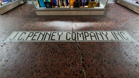 JCPenney tile mosaic in front of Olympian Athletics