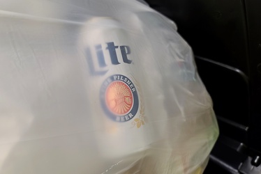 Beer can in a trash bag