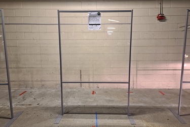 Plastic screens in Whole Foods parking garage