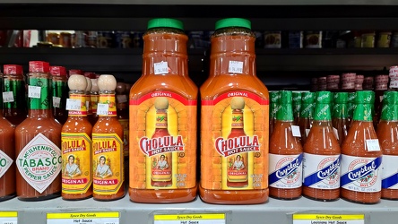 Large bottles of Cholula hot sauce