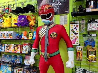 Red Wild Force Ranger wearing necktie and face mask