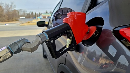 Pumping gas at an Exxon station in Waynesboro, Virginia [01]