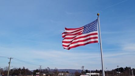 Flag in front of the Exxon on West Main Street