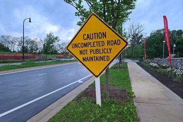 "Caution: Uncompleted road not publicly maintained" [02]