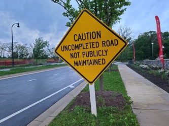 "Caution: Uncompleted road not publicly maintained" [01]