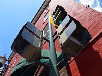 Traffic and pedestrian signals at East Johnson Street and South New Street