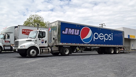 Pepsi truck outside of a Shell station