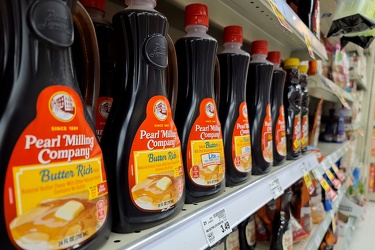 Bottles of Pearl Milling Company pancake syrup