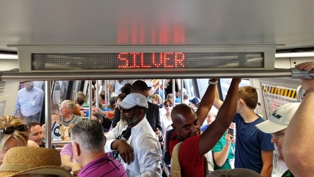 Crowds inside the first Silver Line train