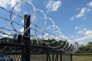 Razor wire fence at Goldsboro Flea Market [03]