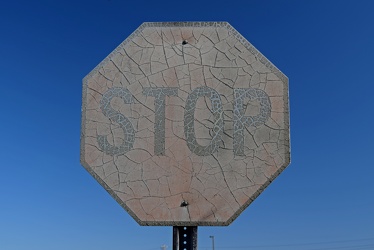 Faded stop sign at New Bern Mall [02]