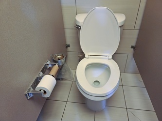 Restroom stall with an ashtray