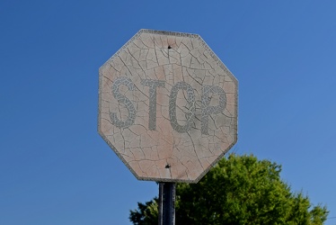 Faded stop sign at New Bern Mall [01]