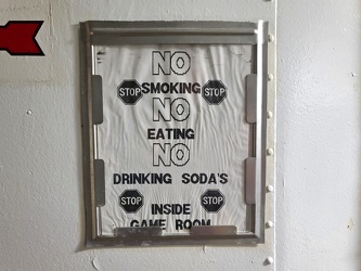 No smoking, eating, or drinking sodas in the USS Wisconsin game room