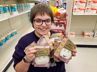 Elyse holds dye-free Scrub Mommy sponges