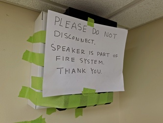 "Please do not disconnect.  Speaker is part of fire system.  Thank you."