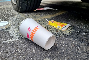 Trash in the parking lot at Deptford Mall