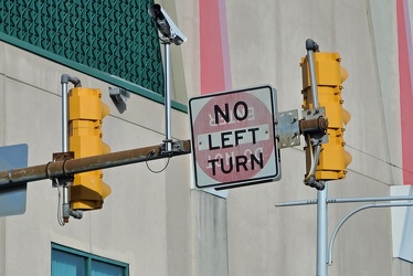 "NO LEFT TURN" sign printed over "DO NOT ENTER" sign