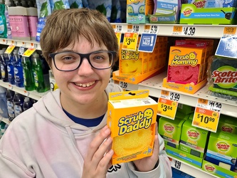 Elyse poses with Scrub Daddy [02]