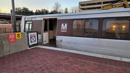 Train at Vienna Metro station, with front beyond the station