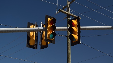 Traffic signals over Church Street and Commercial Avenue