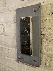 Elevator call buttons at Petersburg Habitat for Humanity ReStore