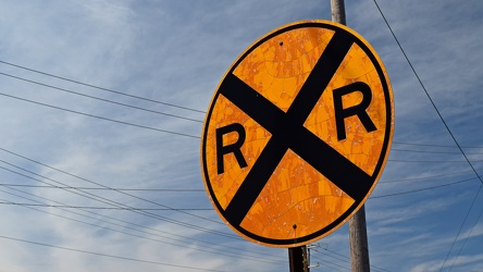 Weathered railroad crossing sign [03]