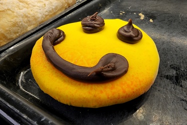 Cookie with a chocolate happy face