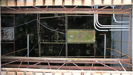 View down open roof hatch at Ames building in Diamond Point Plaza