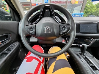 Sitting in the car wearing Maryland flag leggings