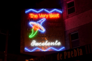 Neon sign for Los Taquitos de Puebla