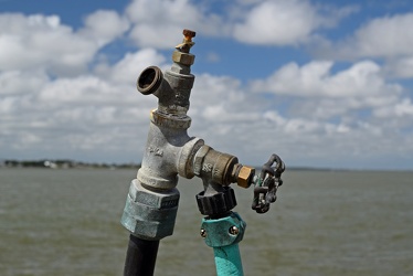 Hose connections at a fish cleaning table