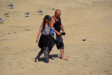 Couple walking on the beach in Ocean City, Maryland