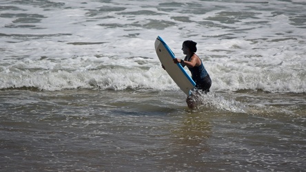 Woman with a boogie board