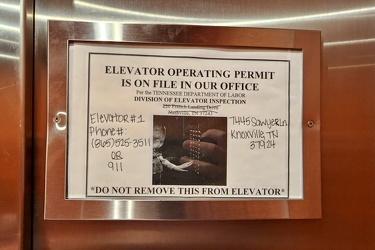 Sign in the elevator permit holder at Hampton Inn Knoxville East