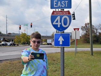 Elyse photographs an I-40 shield [02]