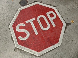 Stop sign embedded in concrete