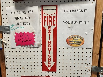 Signage in a booth at the Tri-Cities Flea Market