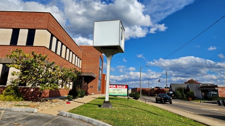 Cube-shaped sign at 1913 West State Street