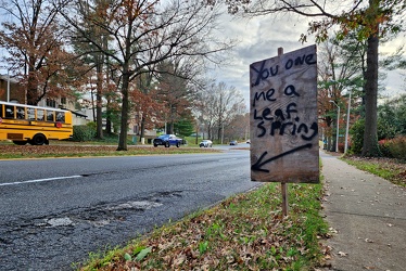 Sign marking a pothole