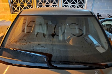 Abandoned vehicle in New Street parking garage with writing in the dirt [03]