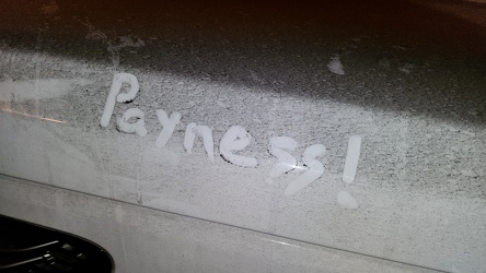 Abandoned vehicle in New Street parking garage with writing in the dirt [05]